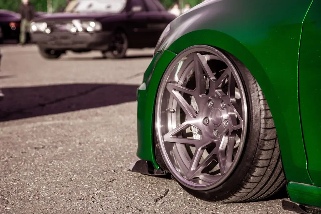 Slammed suspension car with stretched tires