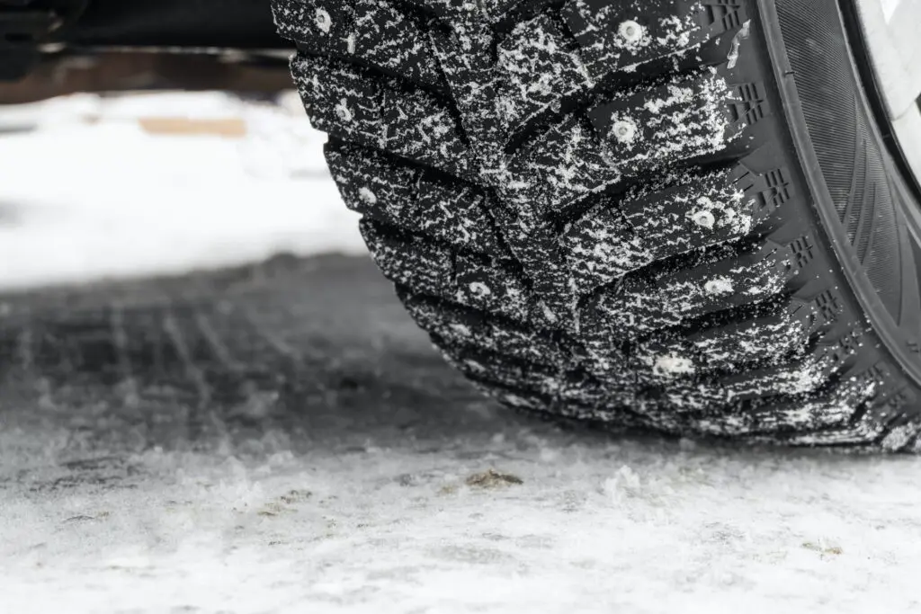 Tread of winter studded tire